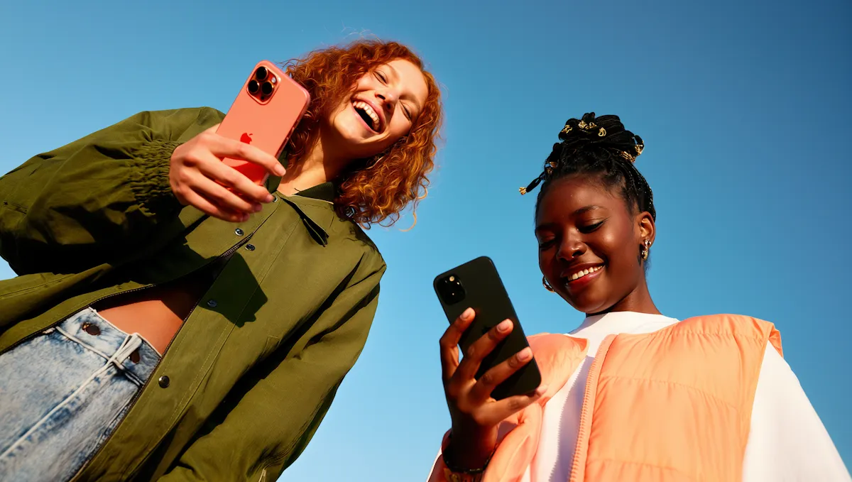 Creator checking their phone outdoors